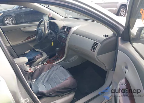 2009 Toyota Corolla Le from USA, damaged, VIN 1NXBU40E69Z145092